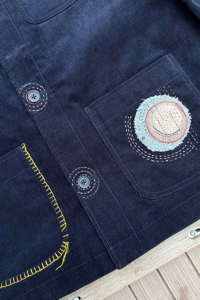 blue corduroy jacket with embroidered patch