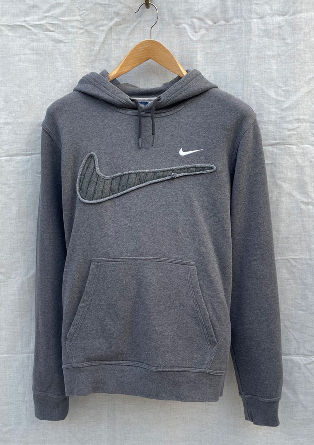 Grey Nike hoodie with quilted swoosh