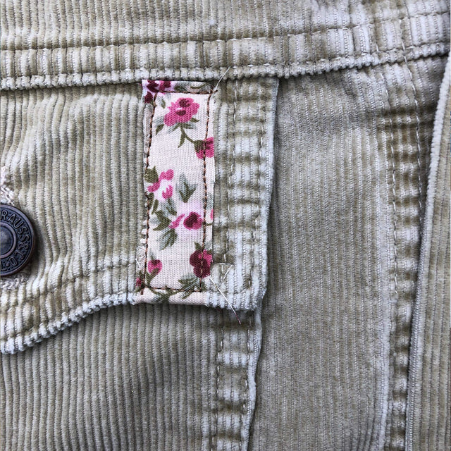 small cream and pink floral patch on corduroy pocket
