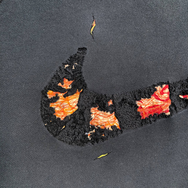 Nike textured swoosh using orange and black  embroidery